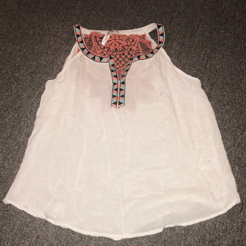 Cute summer top, fits like a Medium